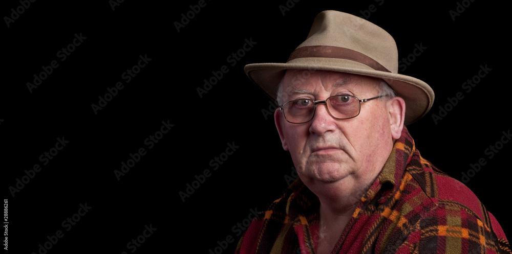 senior male retired wearing glasses and hat senior male retired wearing glasses and hat
