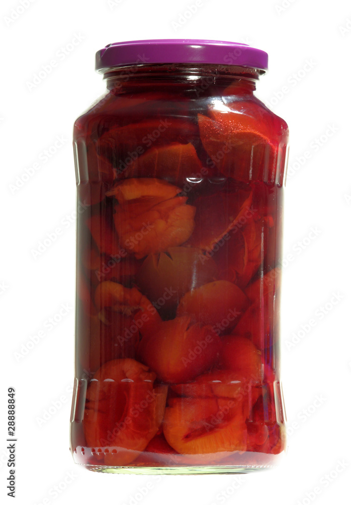 jar with plums isolated on white jar with plums isolated on white