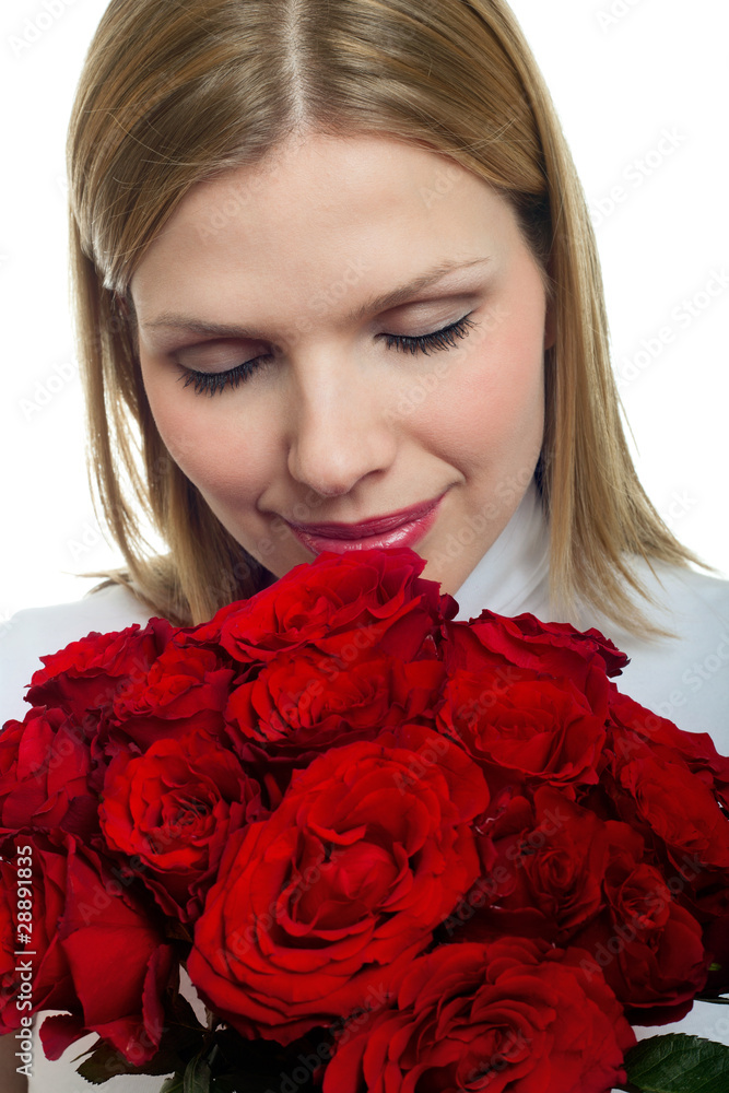 young beautiful woman with a bunch of roses young beautiful woman with a bunch of roses