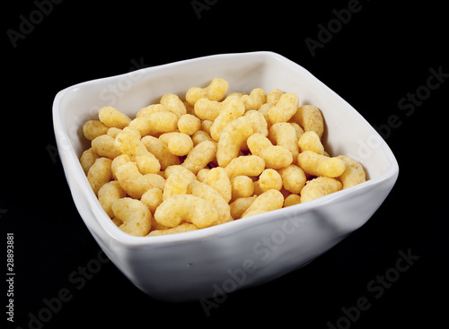 corn flips in a white bowl