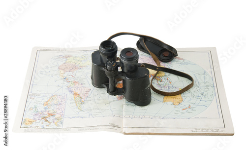 old commander's binoculars with a map