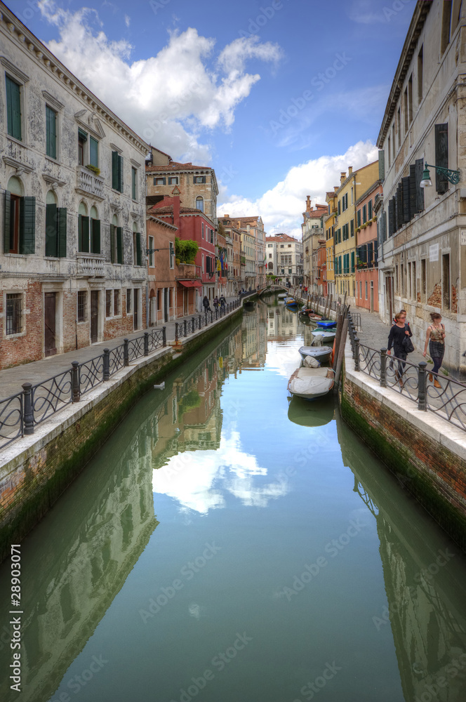 Beautiful view along long canal in Venice Italy
