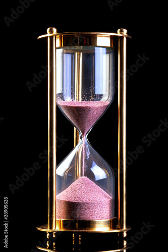 Hourglass sand timer on black