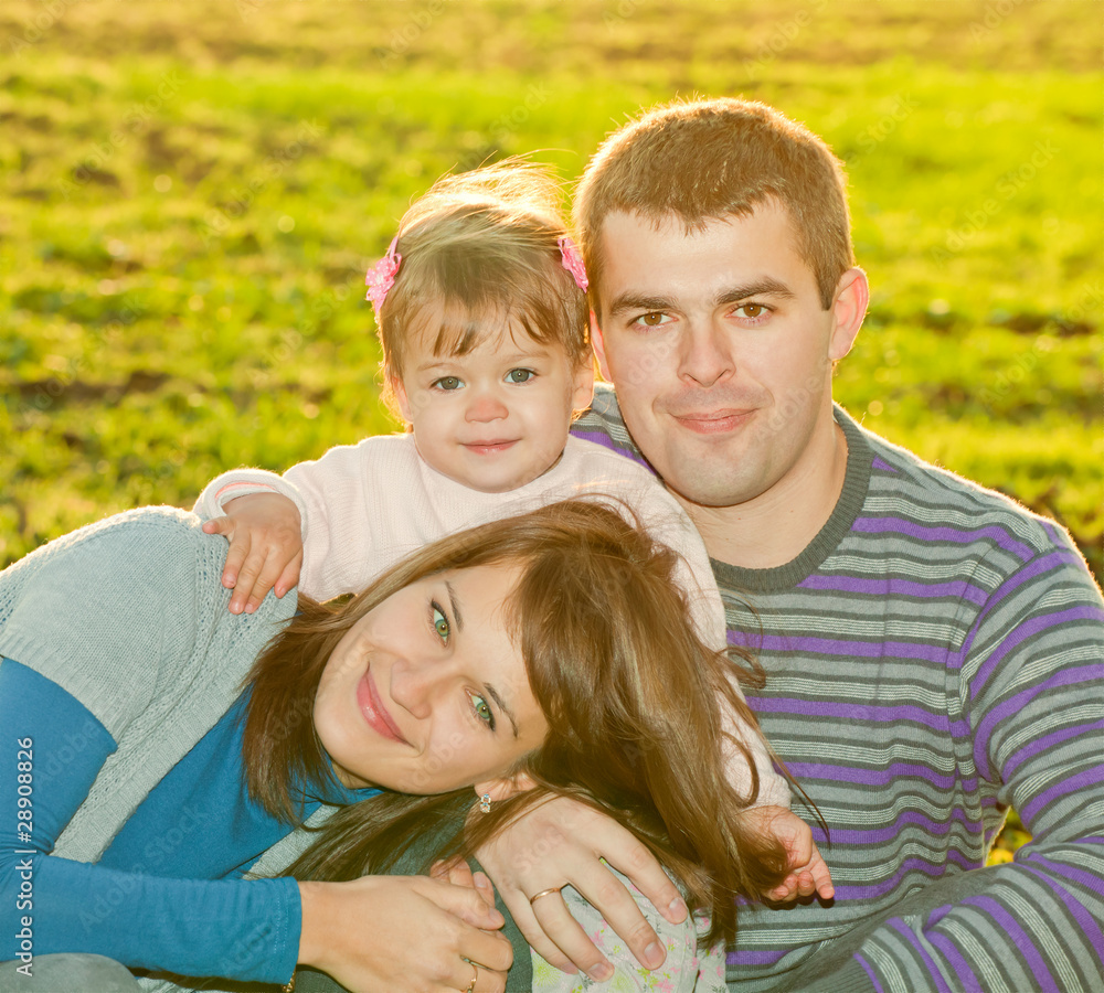 Fototapeta premium Photo of a happy family enjoying a autumn day