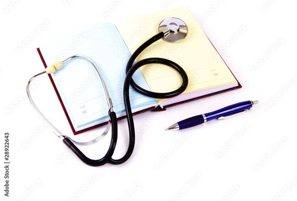 Phonendoscope, pen and notebook isolated on a white background Phonendoscope, pen and notebook isolated on a white background