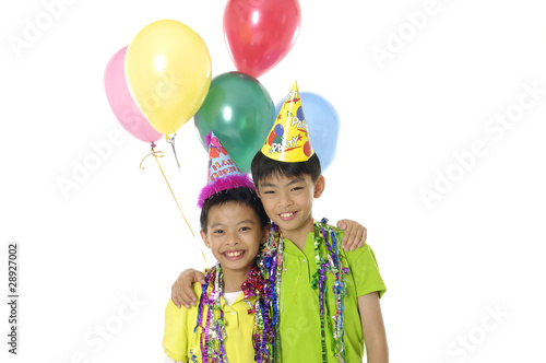 Two little boy celebrate birthday.
