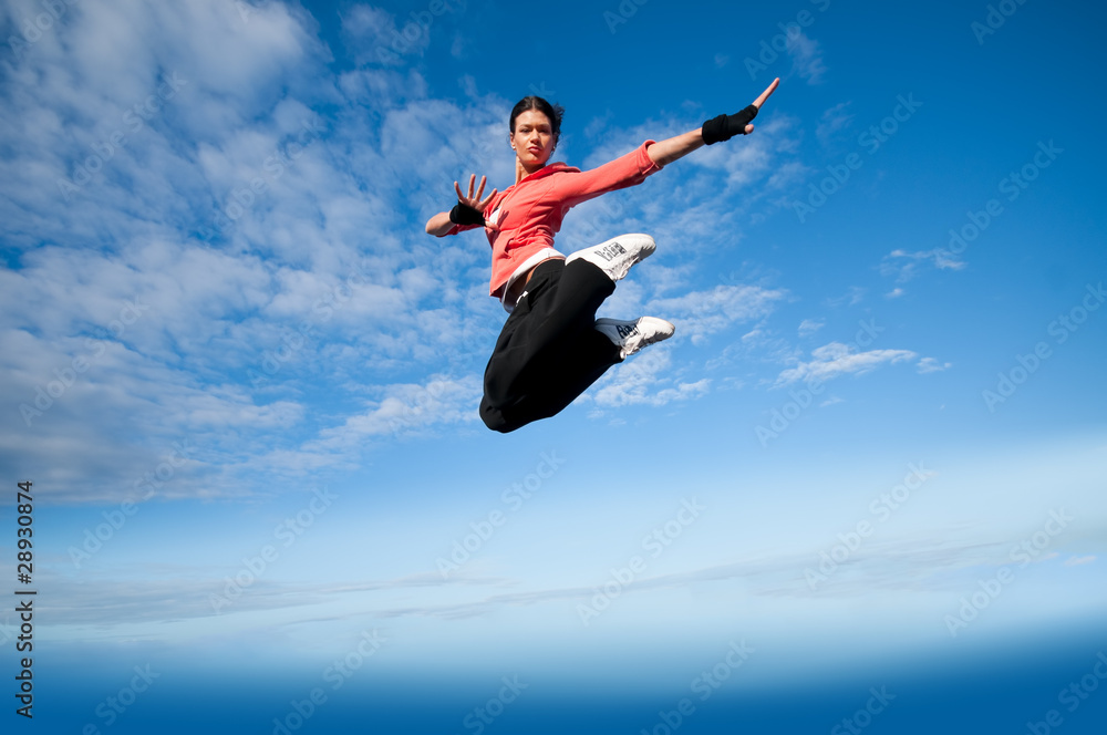 sport woman jumping and fly over sky sport woman jumping and fly over sky