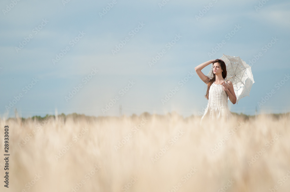 Lonely woman walking in wheat field. Timed. Lonely woman walking in wheat field. Timed.