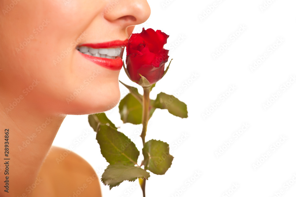 Beautiful caucasian woman with red roses on white isolated backg