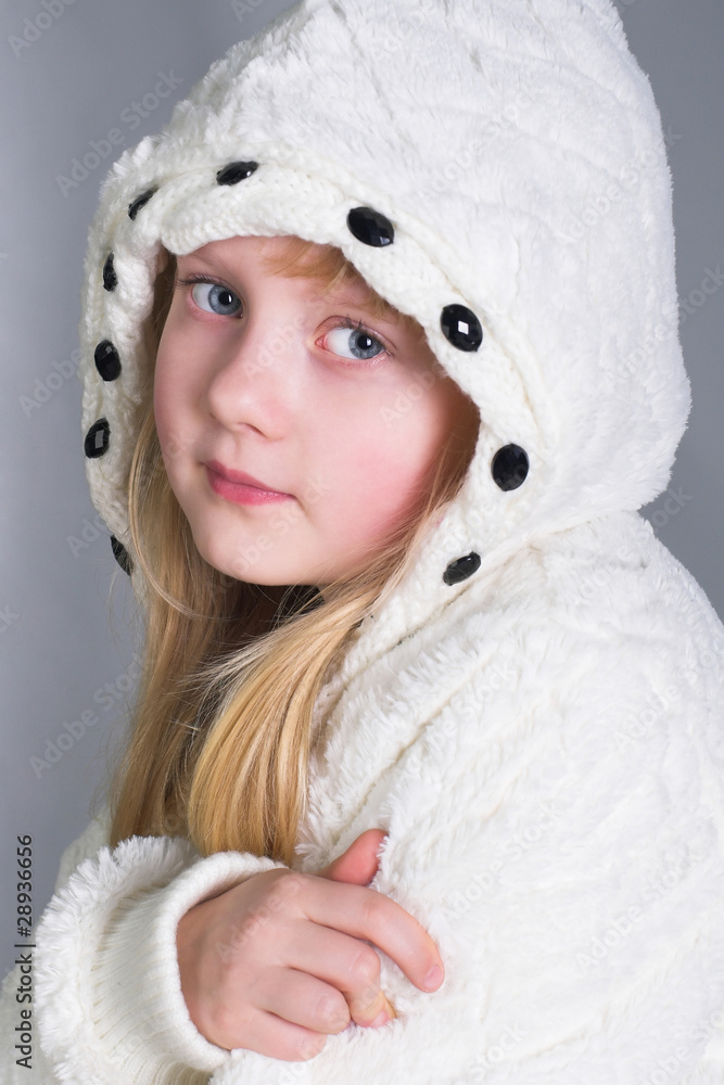 Obraz premium little girl wearing warm winter coat