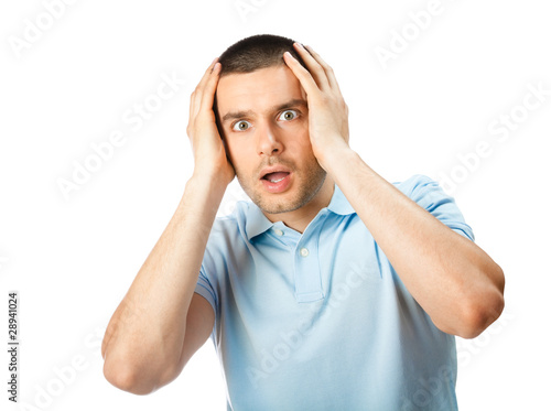 Tableau sur toile Puzzled man, isolated on white background
