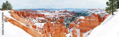 Bryce canyon panorama with snow in Winter with red rocks