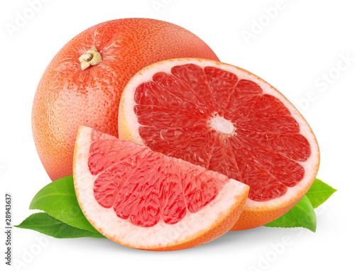 Isolated grapefruit. Cut pink grapefruits with leaves isolated on white background