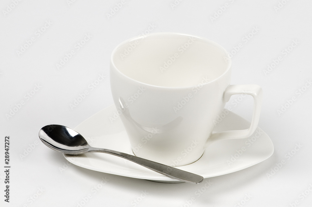 Taza blanca de café vacía con plato y cuchara Stock Photo | Adobe Stock