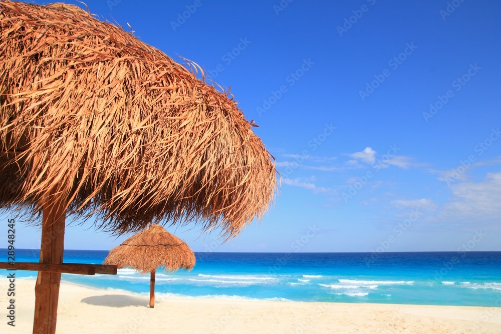 palapa sun roof beach umbrella in caribbean