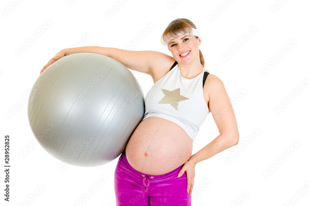 Smiling beautiful pregnant woman holding fitness ball Smiling beautiful pregnant woman holding fitness ball