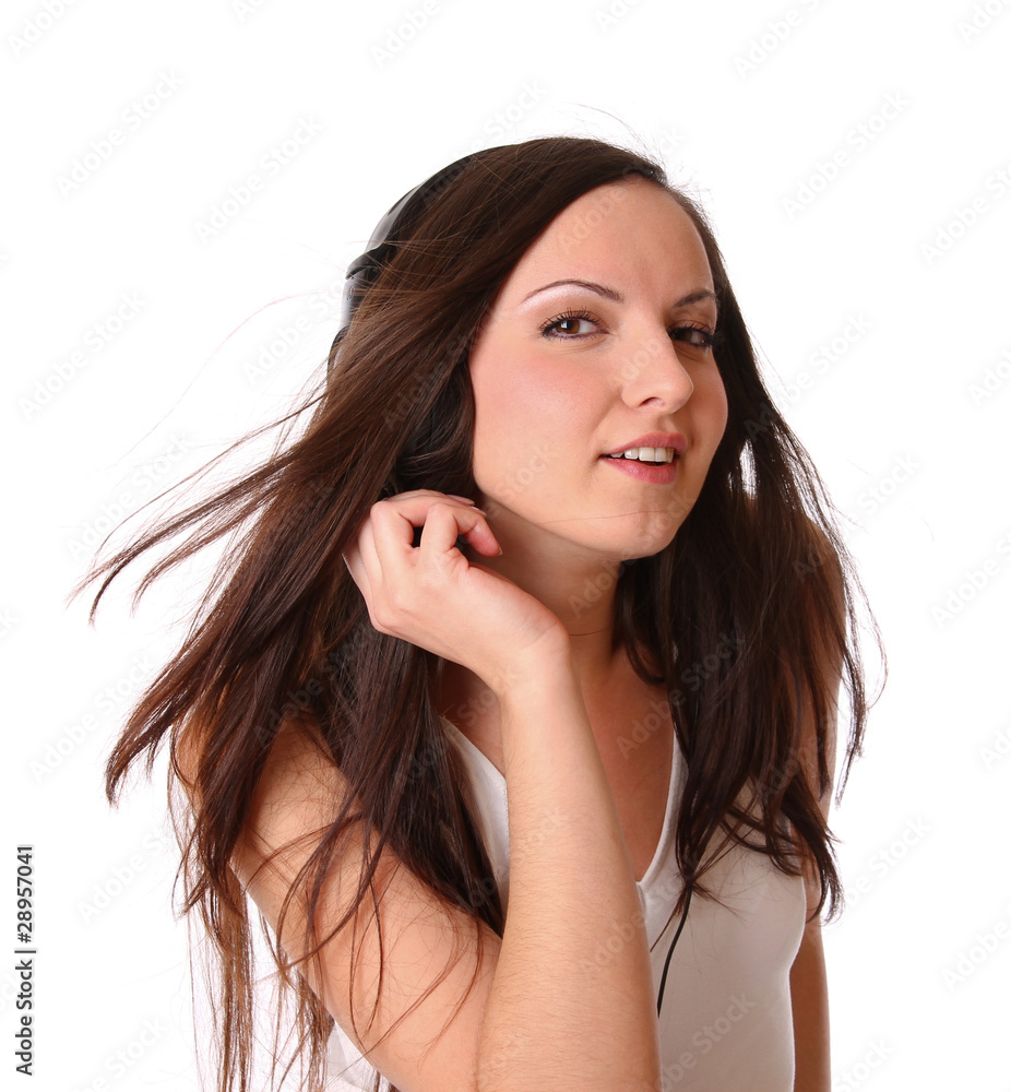 Fototapeta premium teenage girl listening music on headphones