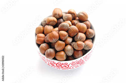 A bowl full of hazelnuts