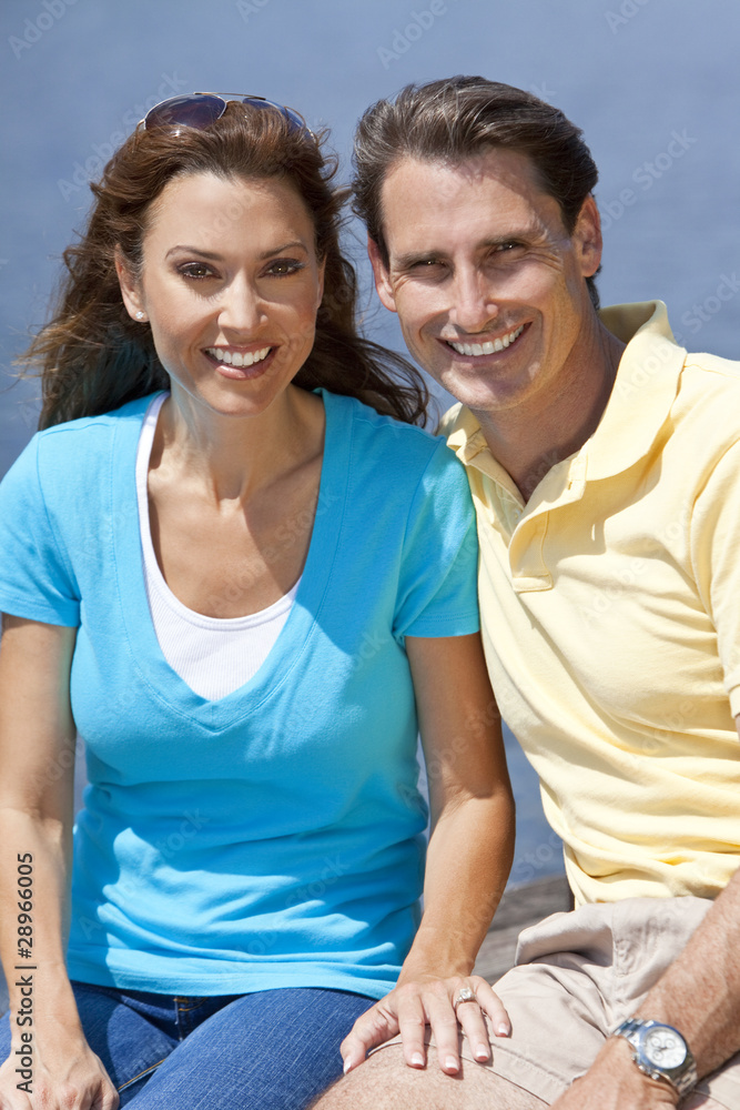 Successful Happy Middle Aged Man & Woman Couple Sitting Outside Successful Happy Middle Aged Man & Woman Couple Sitting Outside