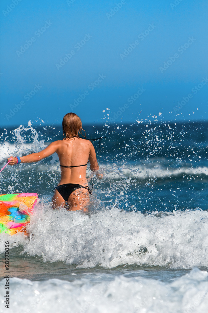 Woman running in the sea