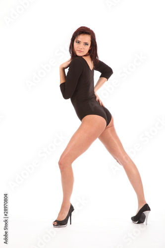 Sexy girl long legs wearing heels and leotard