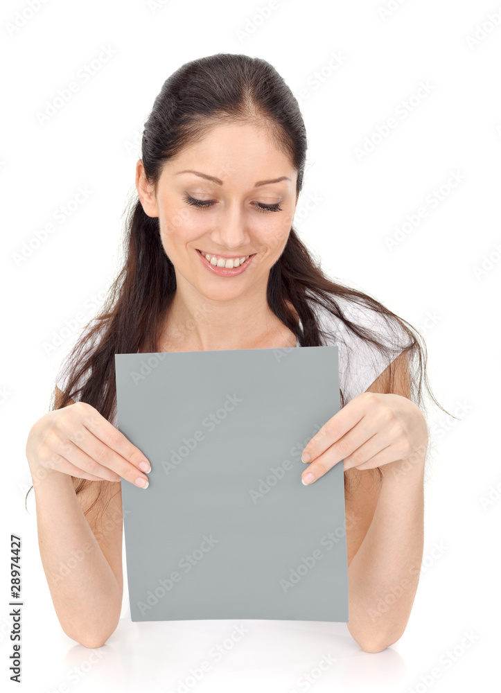 Young beautiful lady holding blank gray card Young beautiful lady holding blank gray card