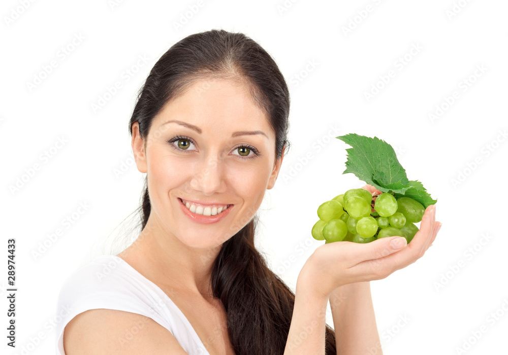 Young attractive woman with green grape cluster Young attractive woman with green grape cluster