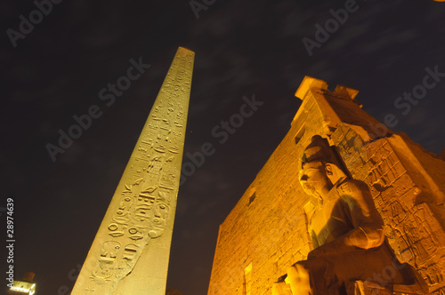 Statue of Ramses II and Obelisk of Luxor Temple. Luxor, Egypt