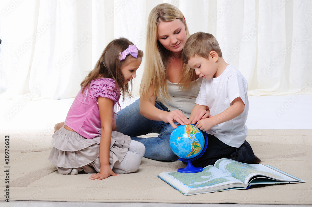 Fototapeta premium young mother, her daughter and young son