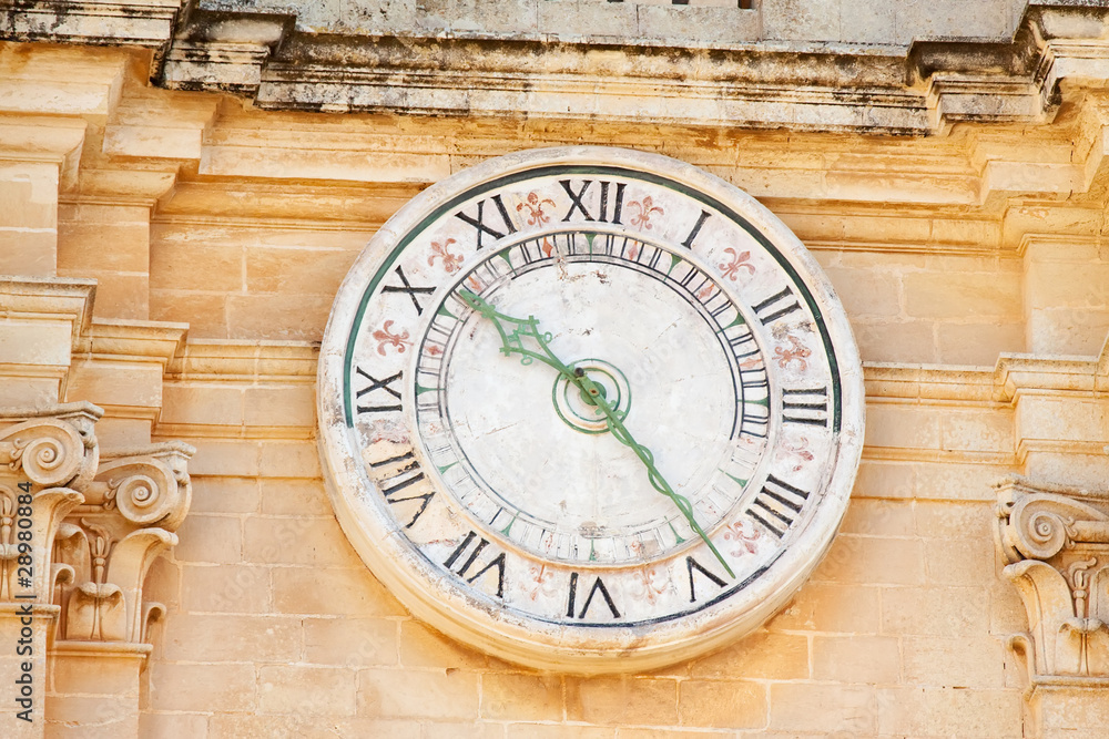 Fototapeta premium Clock on Cathedral Tower at Mdina
