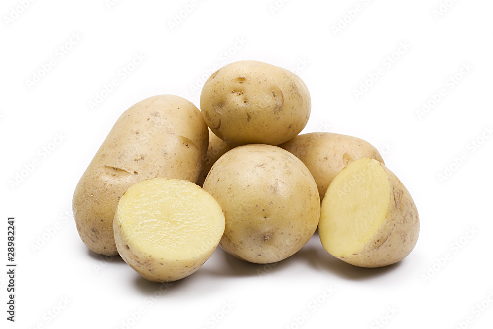 some yellow potatoes isolated on white background some yellow potatoes isolated on white background