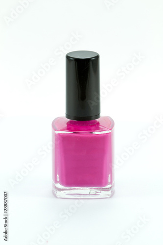 Pink nail polish on white background