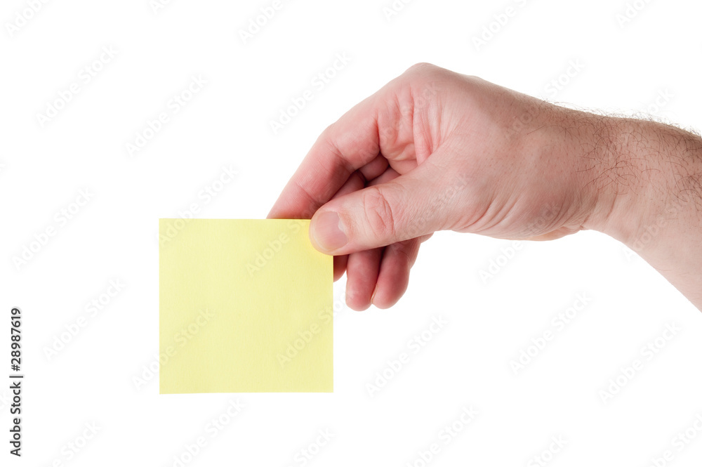 Hand Holding a Blank Yellow Paper for Your Copytext Hand Holding a Blank Yellow Paper for Your Copytext