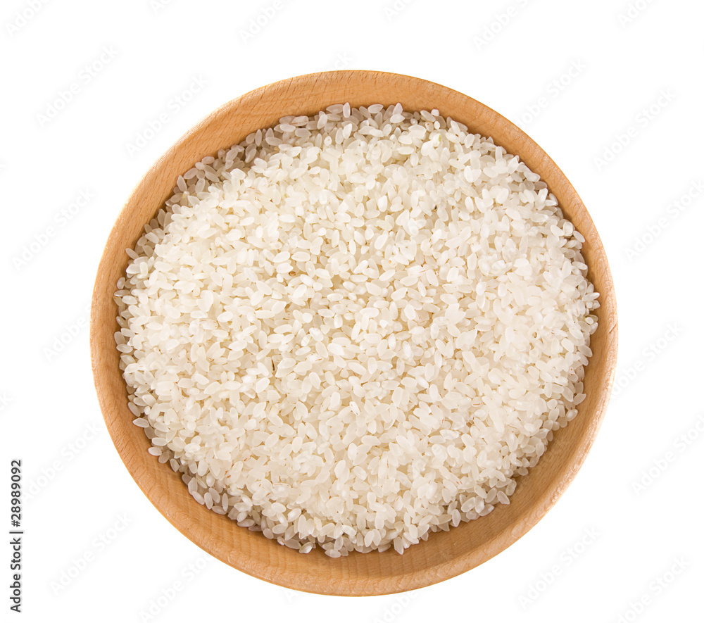 rice grain in wooden plate isolated on white rice grain in wooden plate isolated on white
