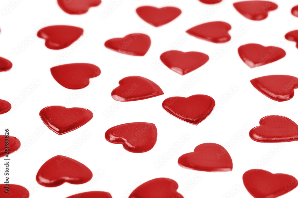 Red hearts confetti on white background Red hearts confetti on white background