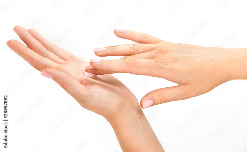 Beautiful woman's hands with care cream Beautiful woman's hands with care cream
