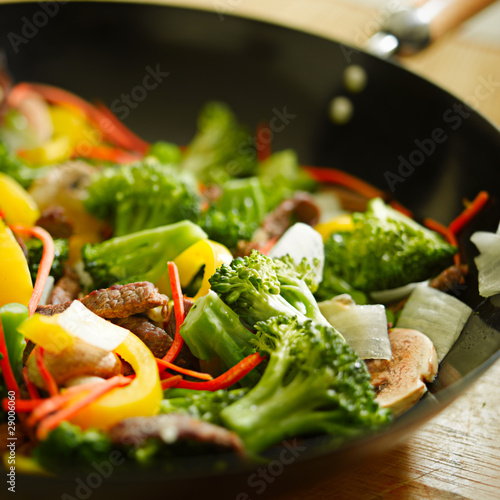 wok stir fry closeup with selective focus photo