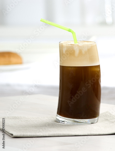 a glass of frappee coffee photo