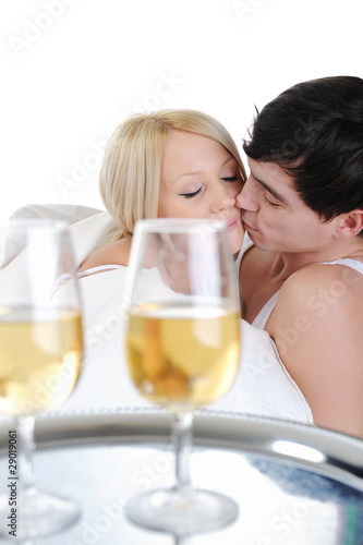 Young couple drinking champagne in bed © Valeriy Lebedev