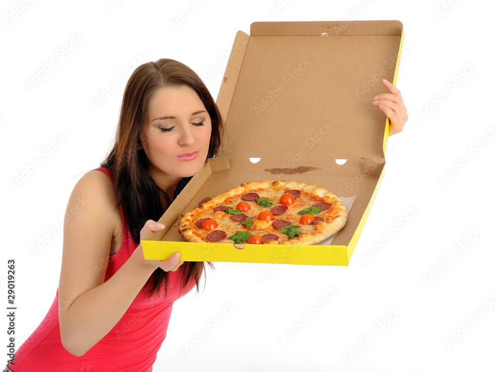 Pretty young casual woman with tasty pizza in delivery paper box Pretty young casual woman with tasty pizza in delivery paper box