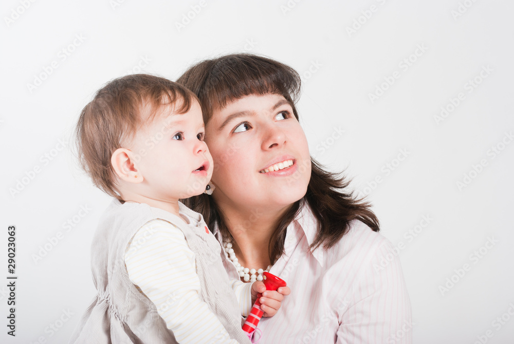 Portrait happy mums with a daughter on a white background.. Portrait happy mums with a daughter on a white background..