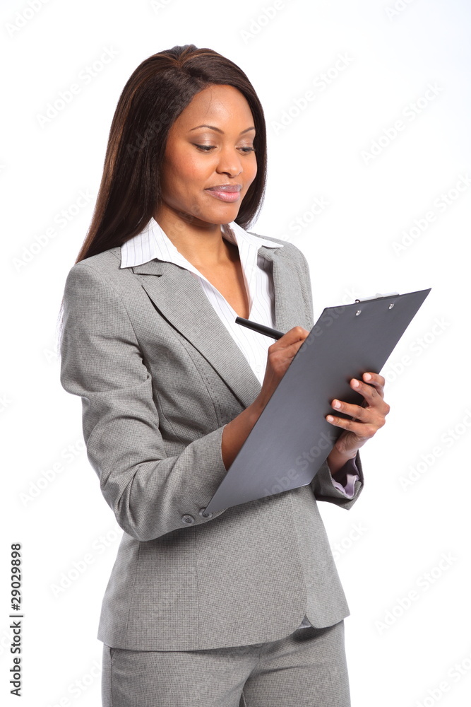 Beautiful black business woman with clipboard Beautiful black business woman with clipboard