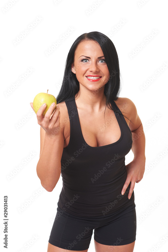 Fitness girl with green apple isolated on white Fitness girl with green apple isolated on white