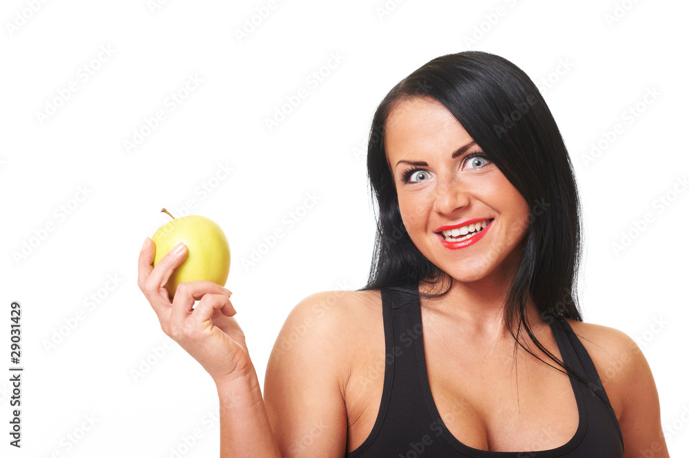 Fitness girl with green apple isolated on white Fitness girl with green apple isolated on white