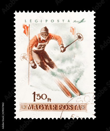 mail stamp printed in Hungary featuring slalom skiing