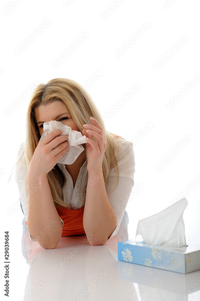 Beautiful young girl having a flu with paper tissues Beautiful young girl having a flu with paper tissues