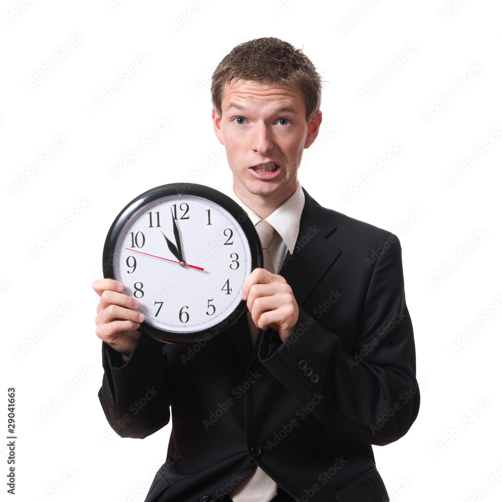 stressed businessman holding clock isolated on white stressed businessman holding clock isolated on white