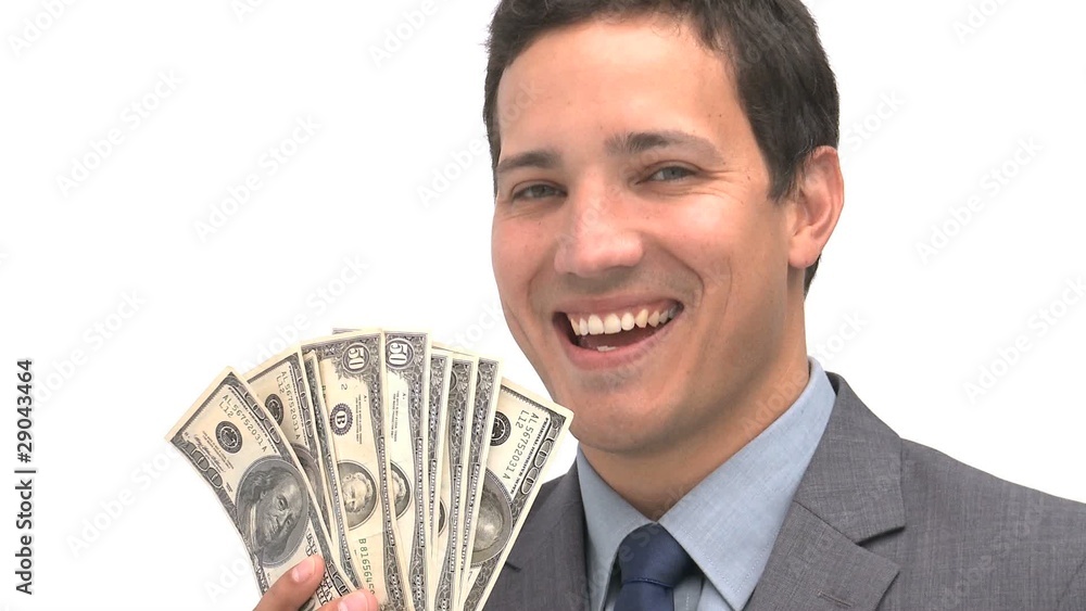 Smiling man pointing dollars Smiling man pointing dollars