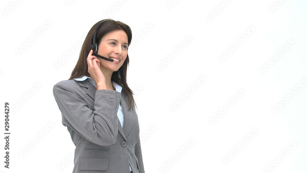 Happy businesswoman talking with headphones Happy businesswoman talking with headphones