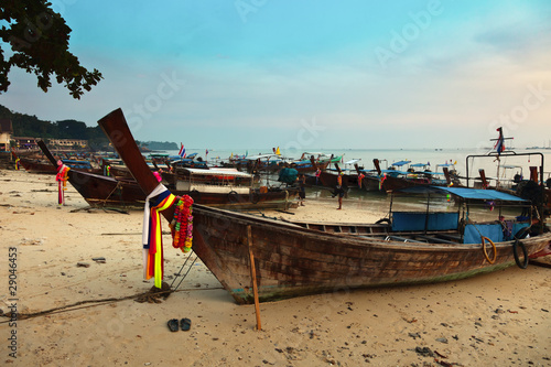 Longboats at sunset on Phi Phi island, Thailand